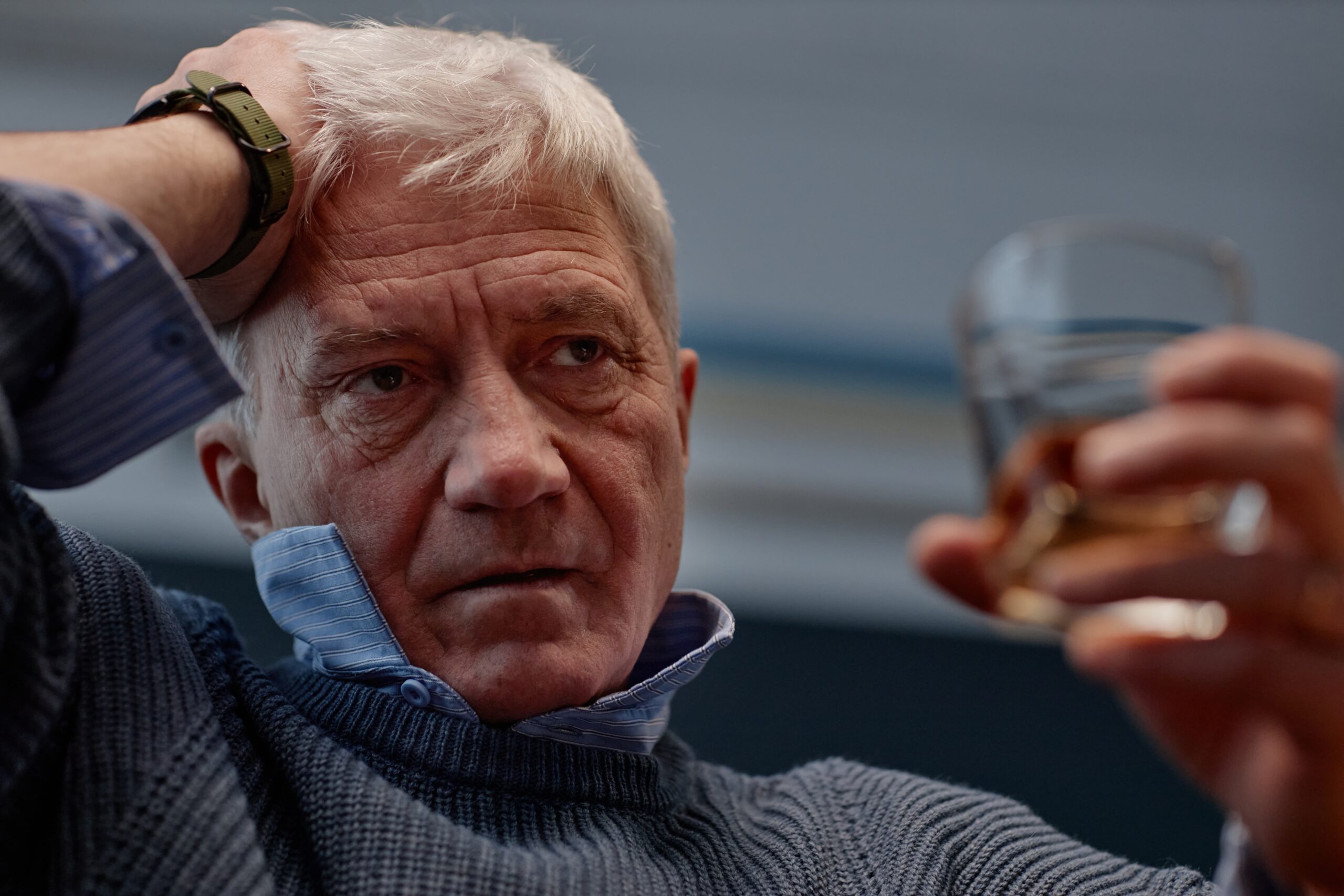 Person considering the effects of alcohol on health