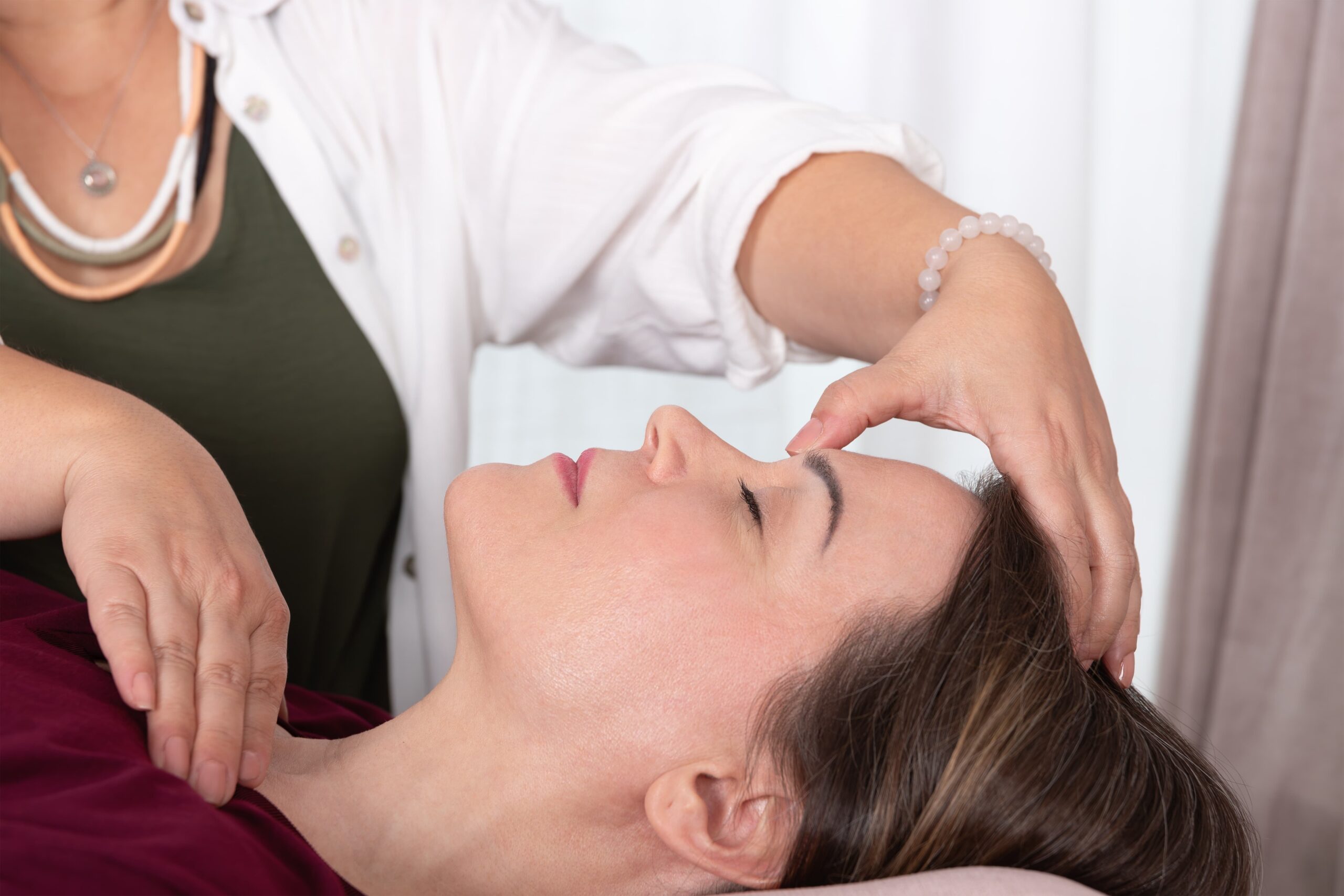 Therapist guiding a client through breathing techniques for impulse control