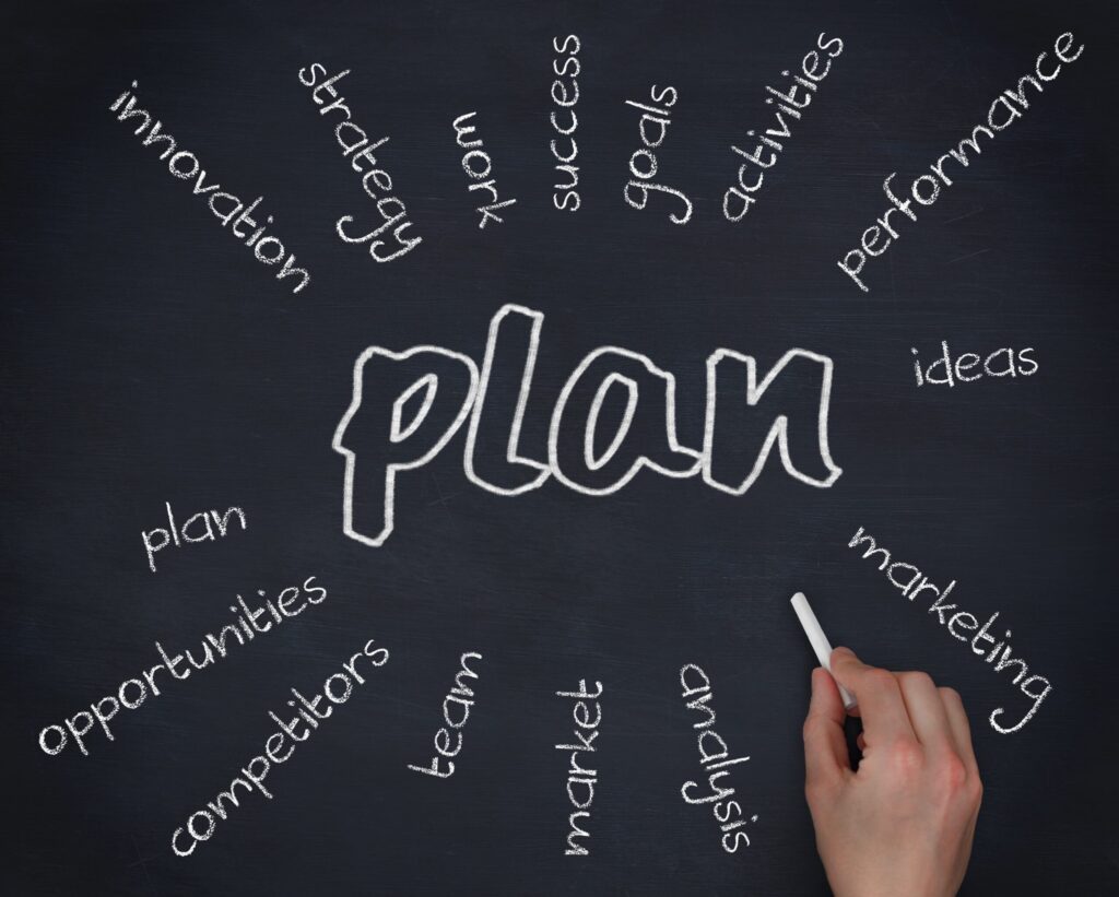 Hand drawing a boundary line between work and personal life to maintain sobriety after recovery.